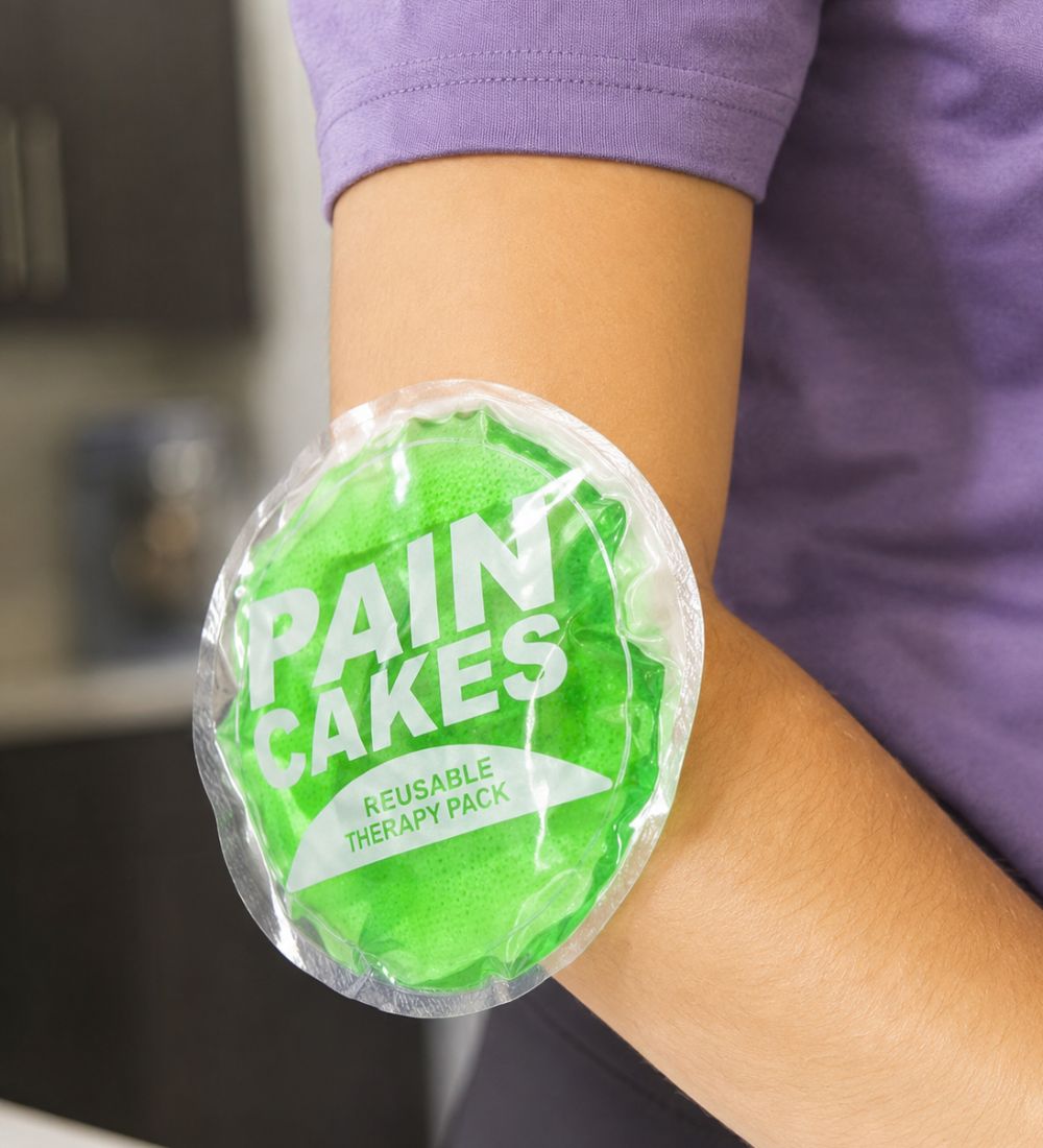 Pain Cakes reusable therapy pack on elbow